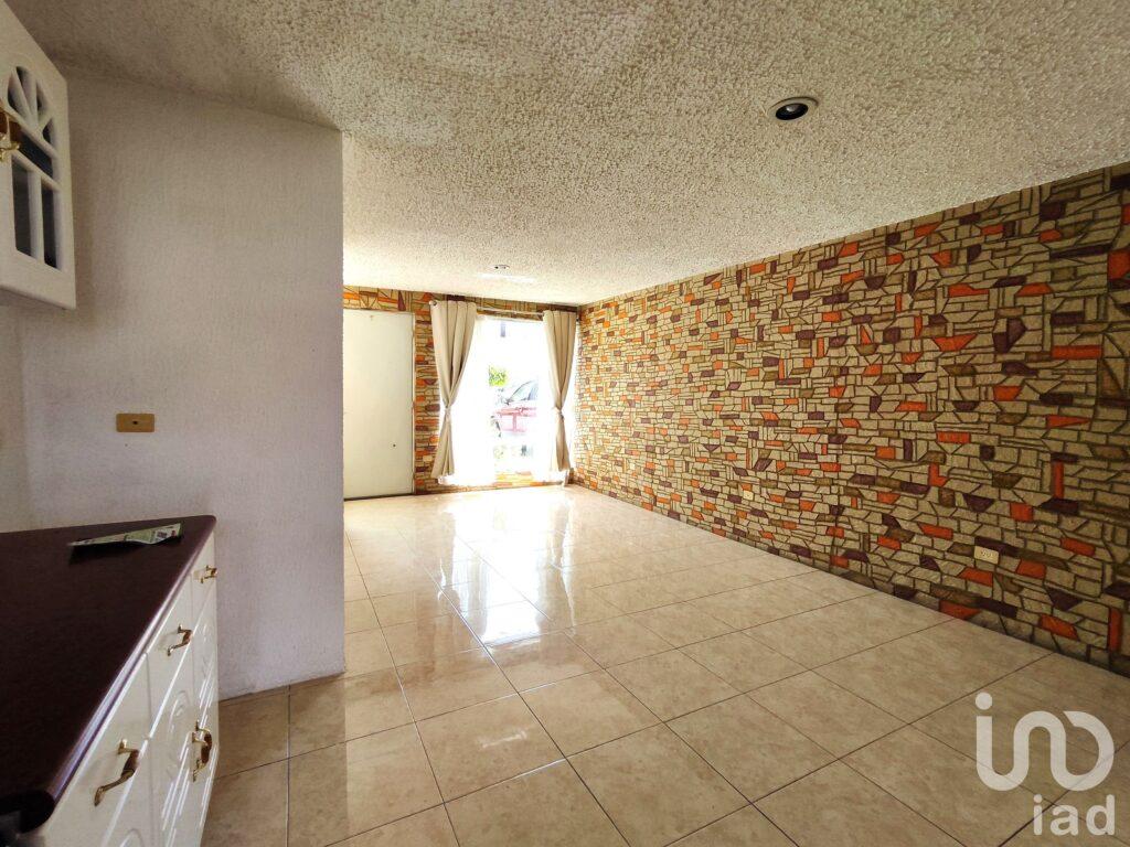 Casa con recámara en planta baja y jardín en Villa Floresta, San Andrés Cholula