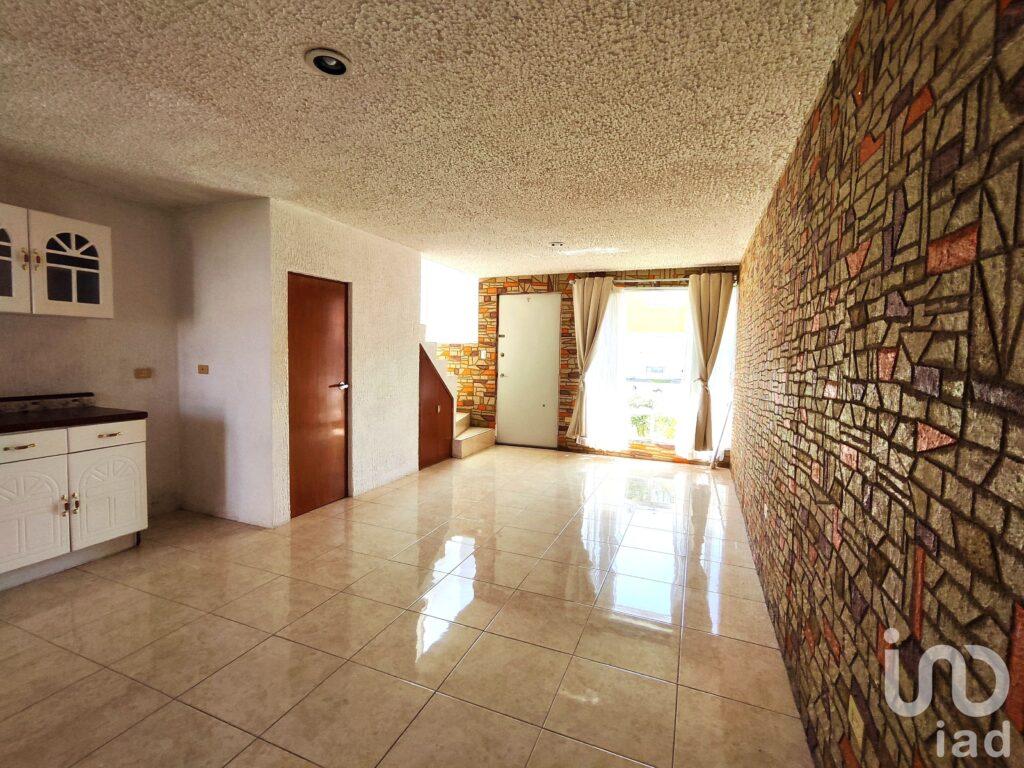 Casa con recámara en planta baja y jardín en Villa Floresta, San Andrés Cholula