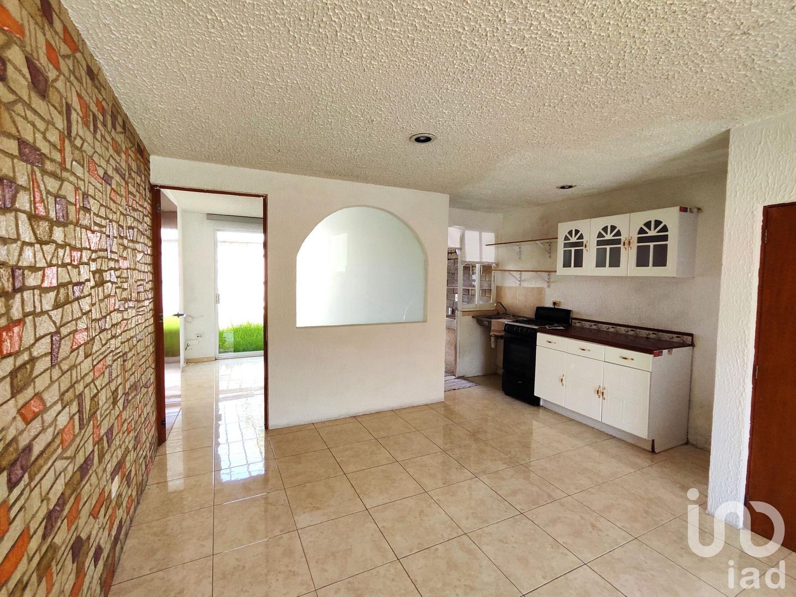 Casa con recámara en planta baja y jardín en Villa Floresta, San Andrés Cholula