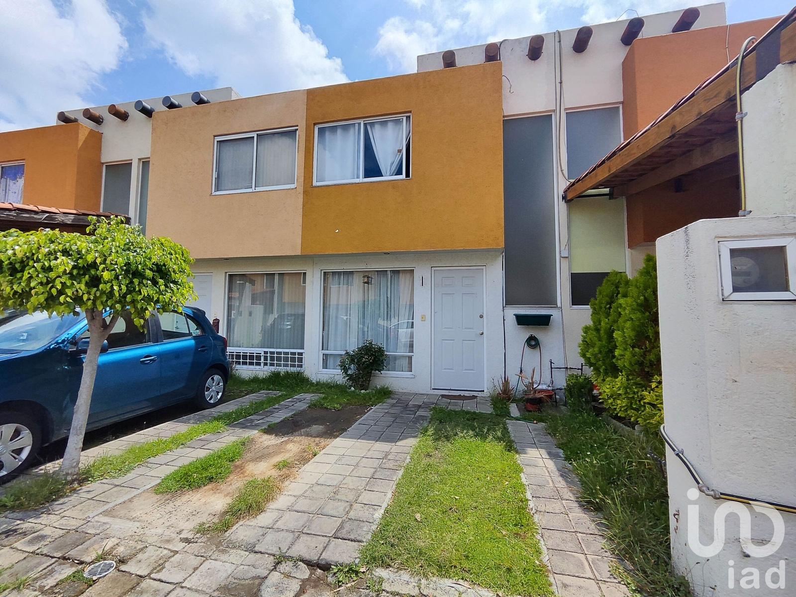 Casa con recámara en planta baja y jardín en Villa Floresta, San Andrés Cholula