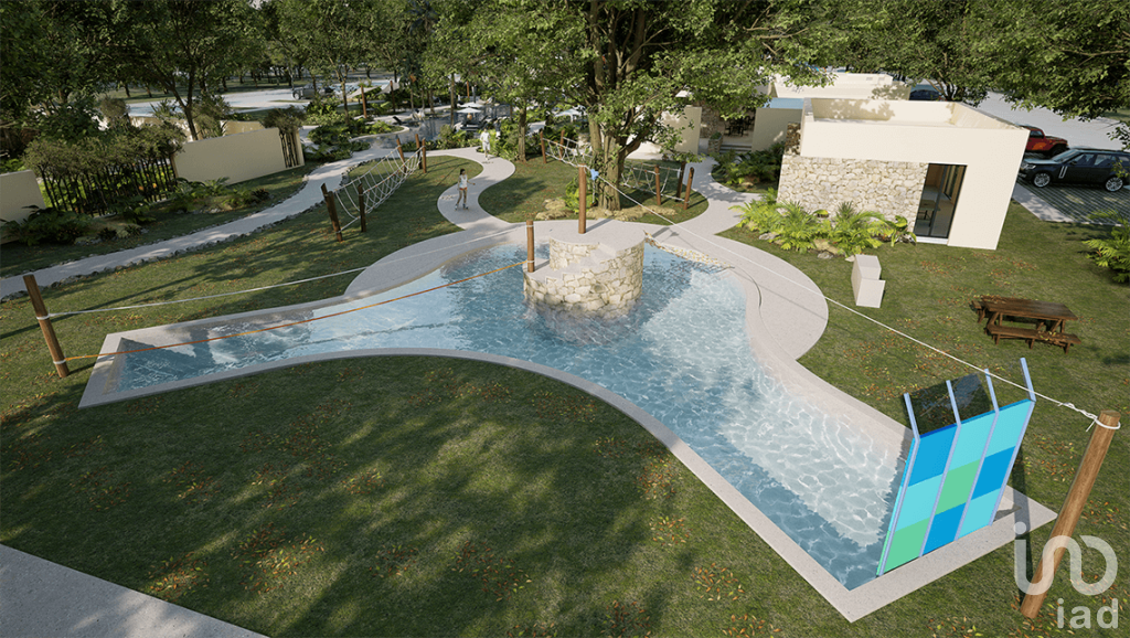 Terreno residencial a 12 km de playa Chuburna 4 Albercas Area Comercial y mas de 50 amenidades