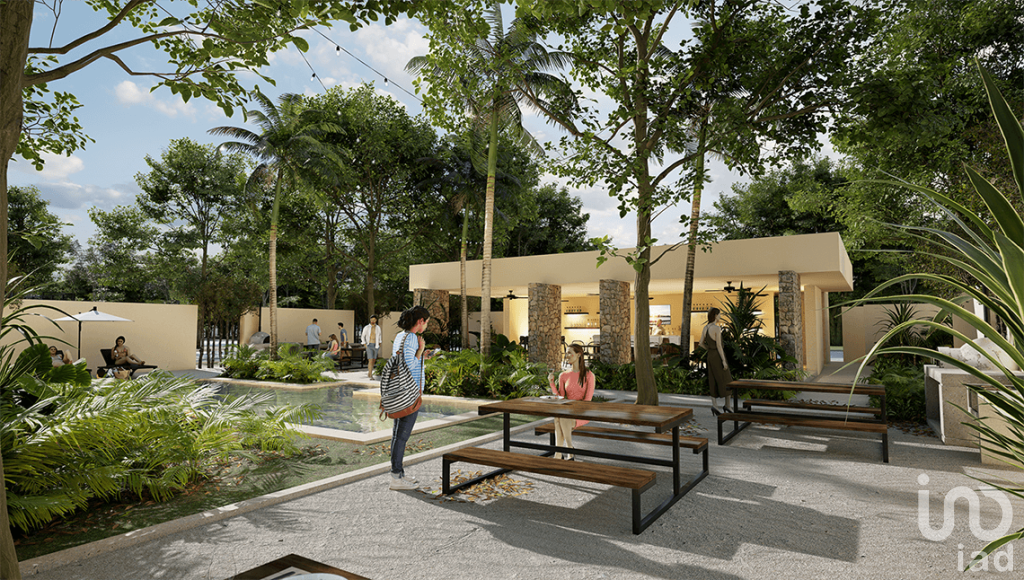 Terreno residencial a 12 km de playa Chuburna 4 Albercas Area Comercial y mas de 50 amenidades