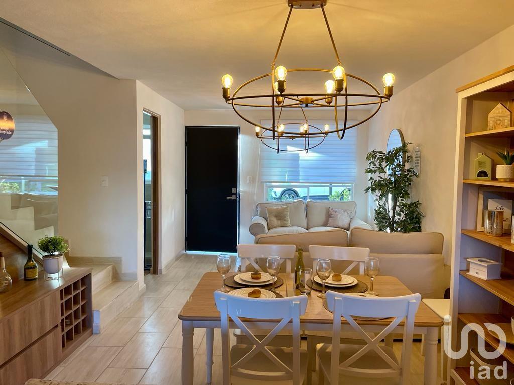 CASA EN VENTA EN LOMAS DE ANGELOPOLIS CON JARDIN, TERRAZA Y AMENIDADES