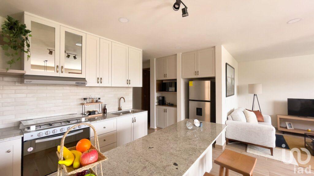 Departamento en planta baja con jardín privado y acabados de lujo cerca de Morrillotla