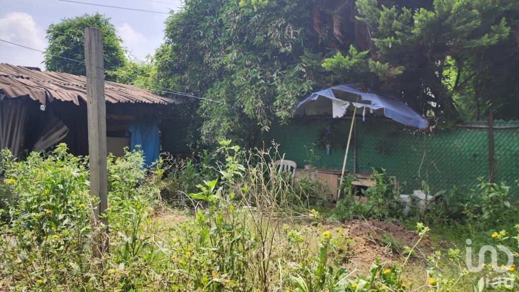 Terreno con proyecto de 4 casas