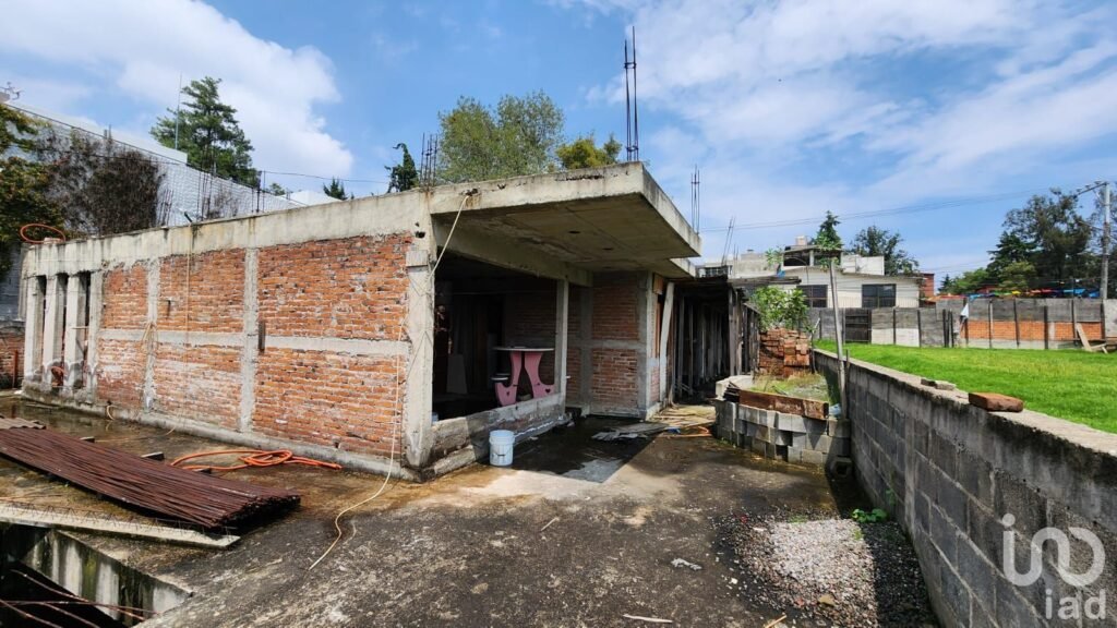 Terreno con proyecto de 4 casas