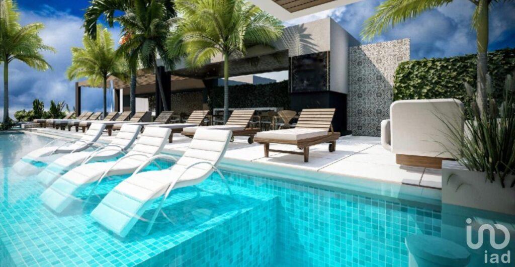 DEPARTAMENTO A PASOS DEL MAR CARIBE, CON ALTA RENTABILIDAD DE INVERSIÓN, EN PLAYA DEL CARMEN.