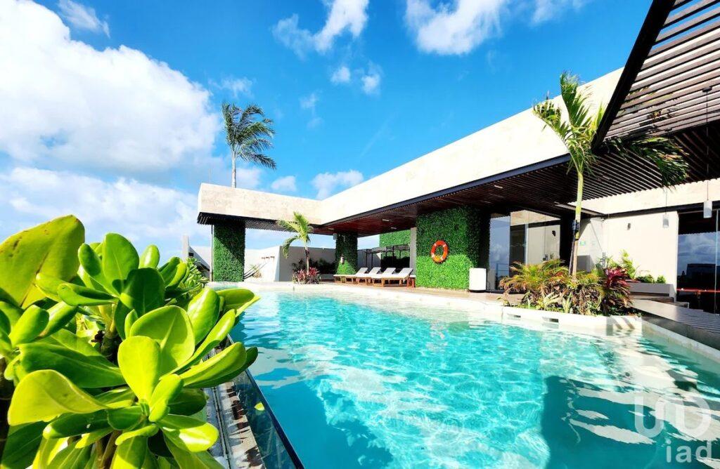 Tu nuevo Loft amueblado con Alberca y cerca de la playa: ¡Vive o invierte en Playa del Carmen!