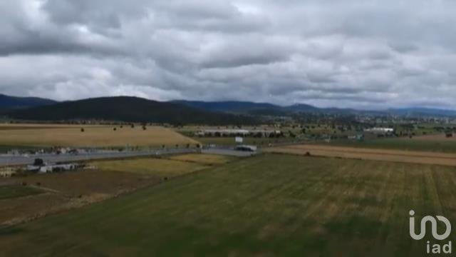 TERRENO A PIE DE CARRETERA A 20 MINUTOS DE PACHUCA