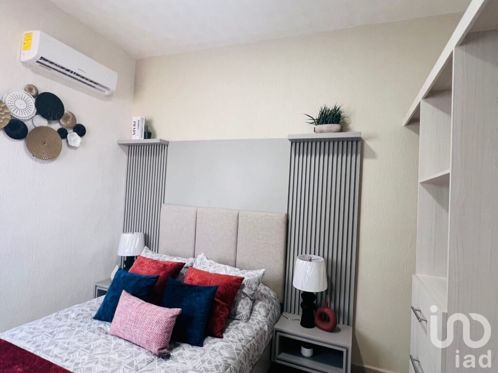 Casa de dos Recámaras en venta en Fraccionamiento cerrado en Supermanzana 249 Cancún Quintana Roo