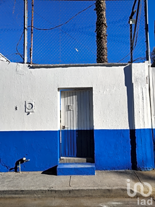 TERRENO CON OFICINAS EN RENTA